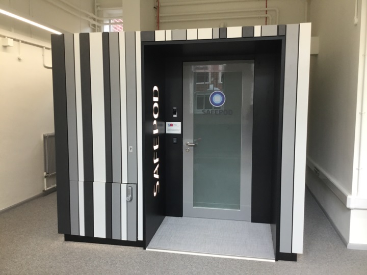 Image on a SafePod, a secure room inside a building, with a door inside providing a safe setting to access sensitive data 